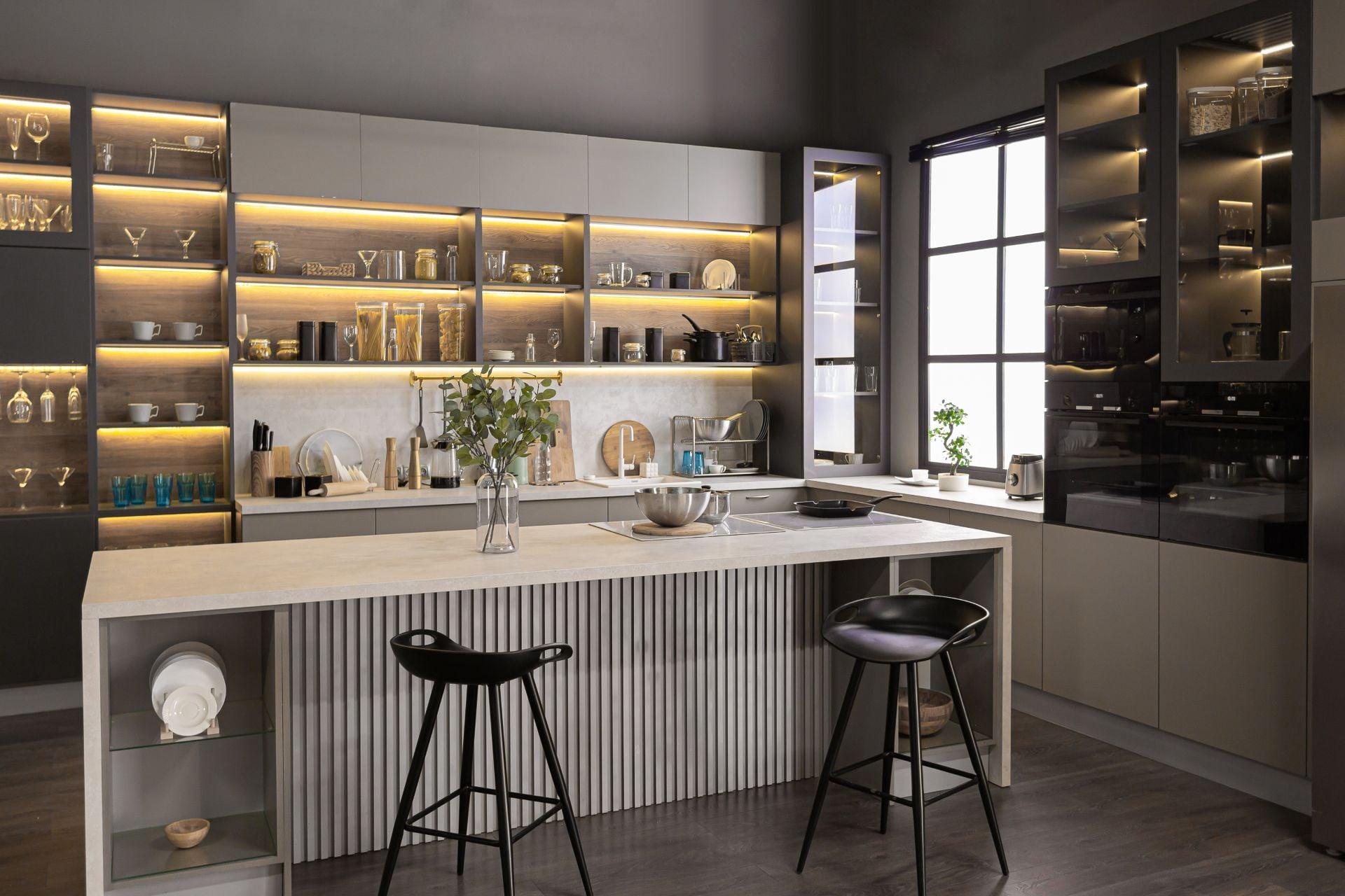 stylish luxury kitchen interior in an ultra-modern spacious apartment in dark colors with super cool led lighting and an island for cooking (1)