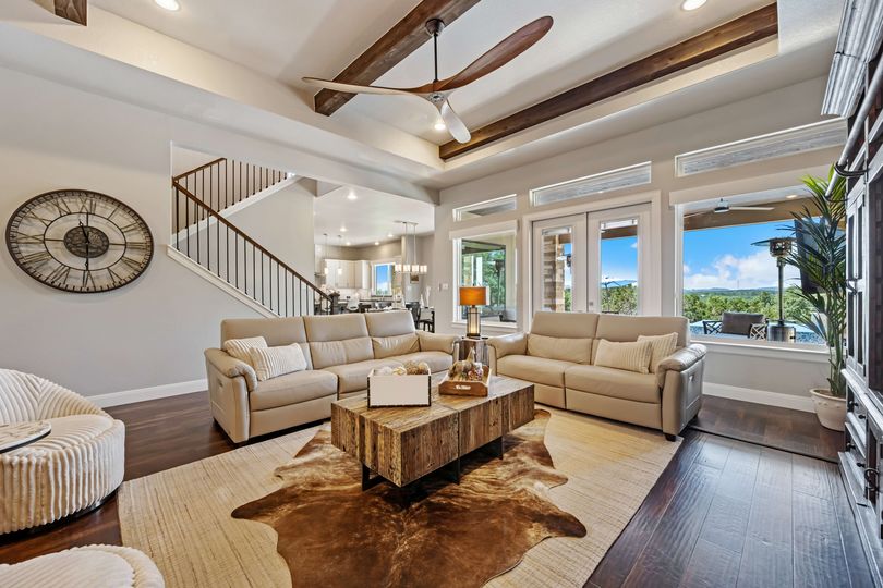 Dallas, Texas - May 27th 2023 a home living room with a stone fireplace 1