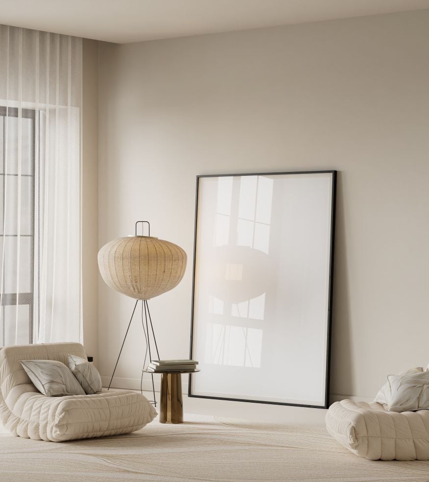 Minimal japandi living room interior featuring a clean poster frame, strong negative space, soft neutral tones