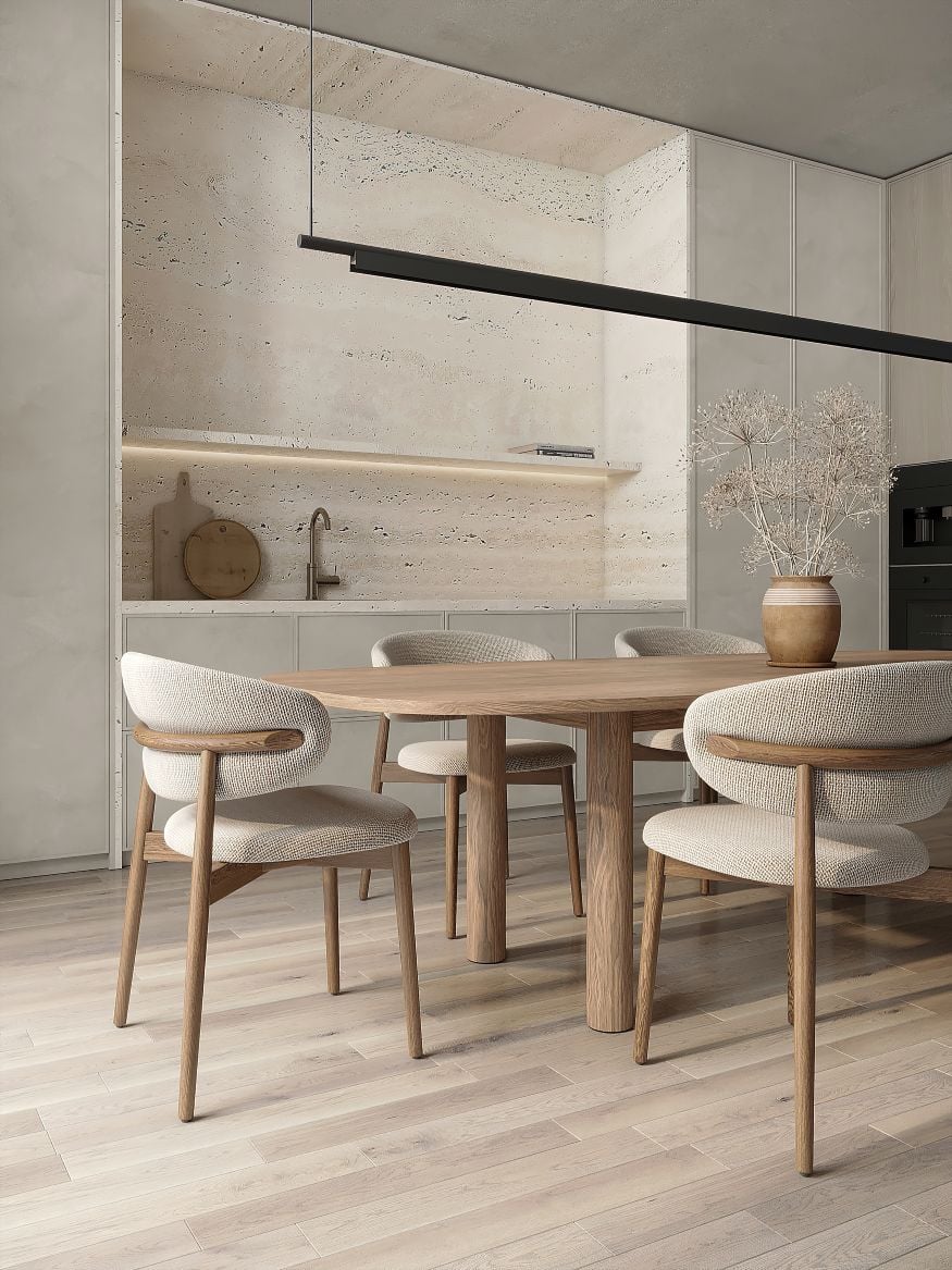 Modern beige kitchen and dining area with contemporary light and chairs