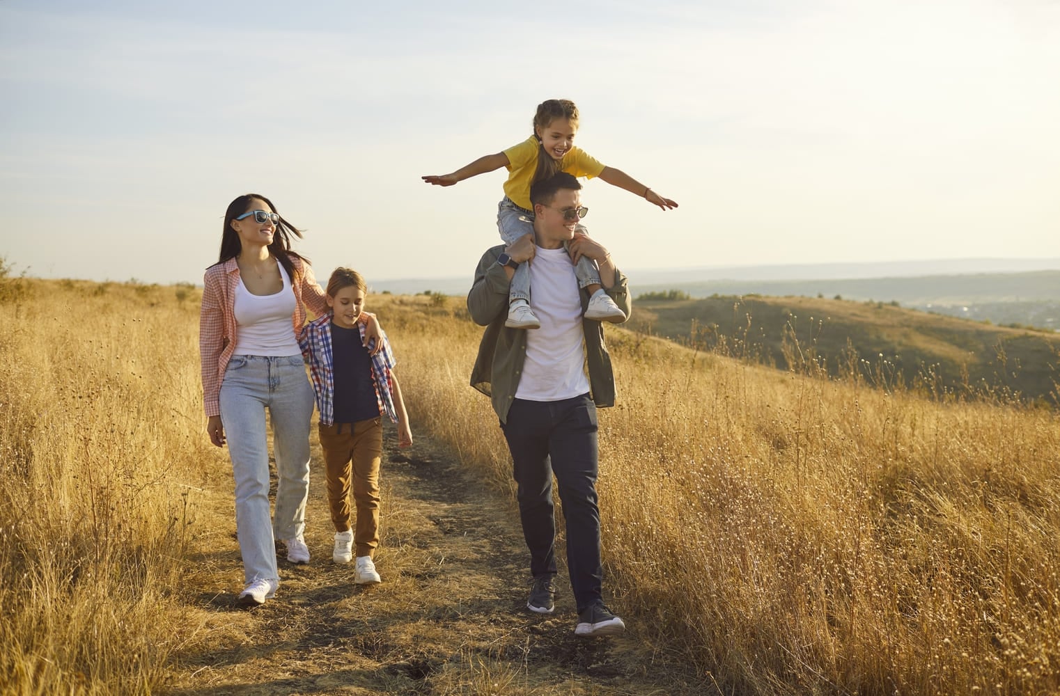 family-walking-on-trail