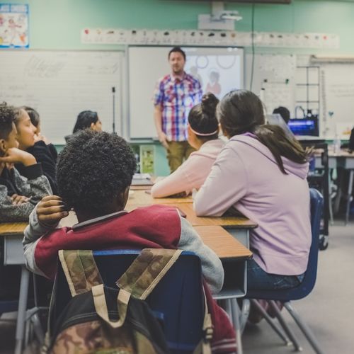How do public schools influence home prices in Boston suburbs