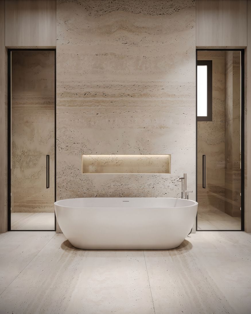 Luxury bathroom with freestanding bathtub, stone walls, and soft lighting. Minimalist spa-style interior in natural tones.