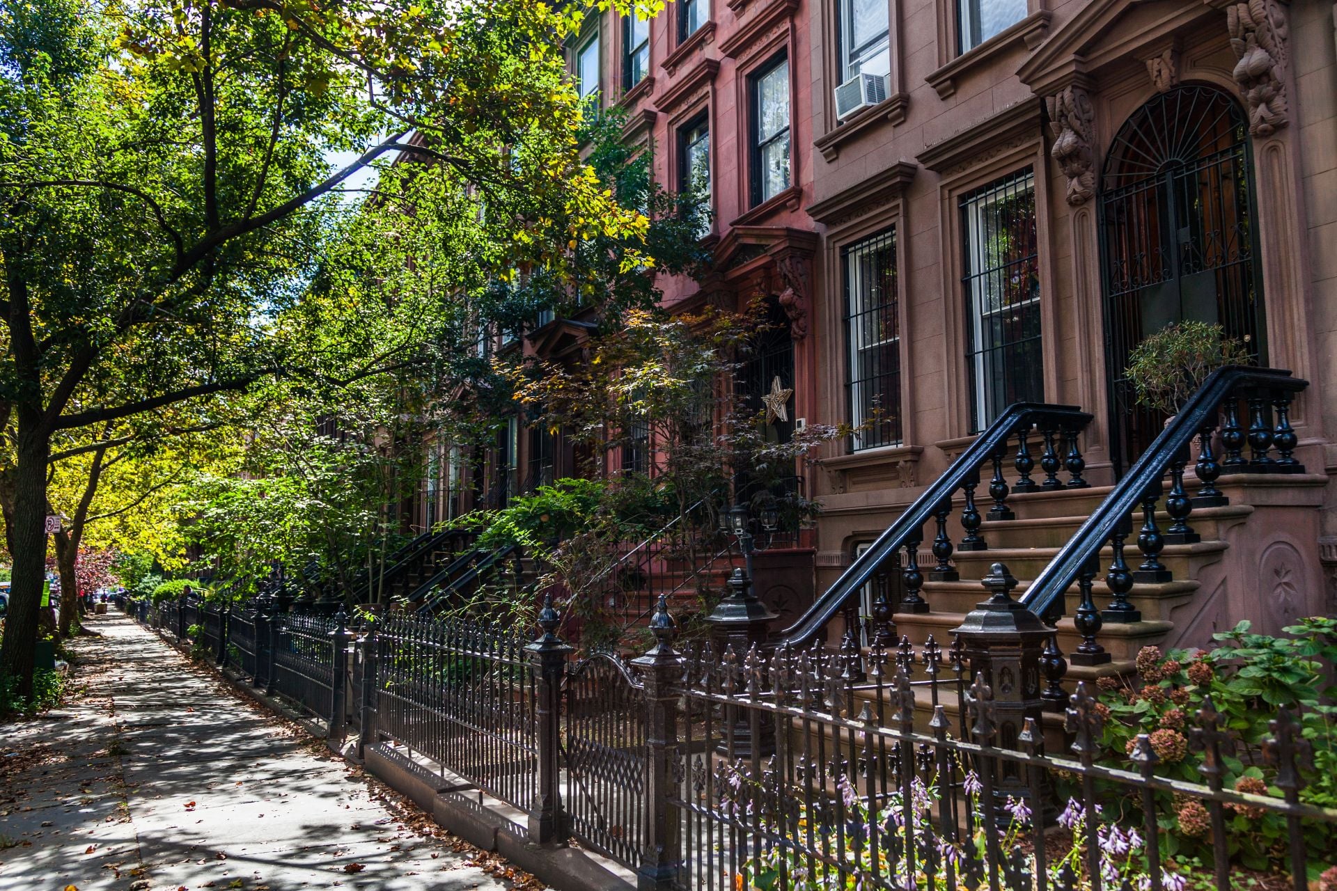 Brownstone Homes along residential Neighborhood sidewalk in Brooklyn New York (1)