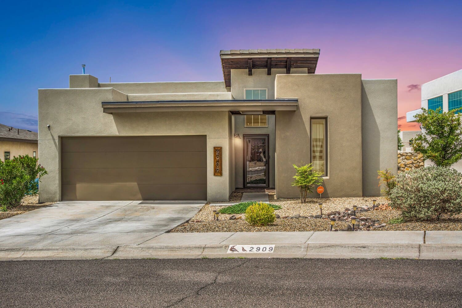 contemporary-home-with-garage-and-landscaping