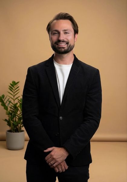 man-in-suit-and-plant
