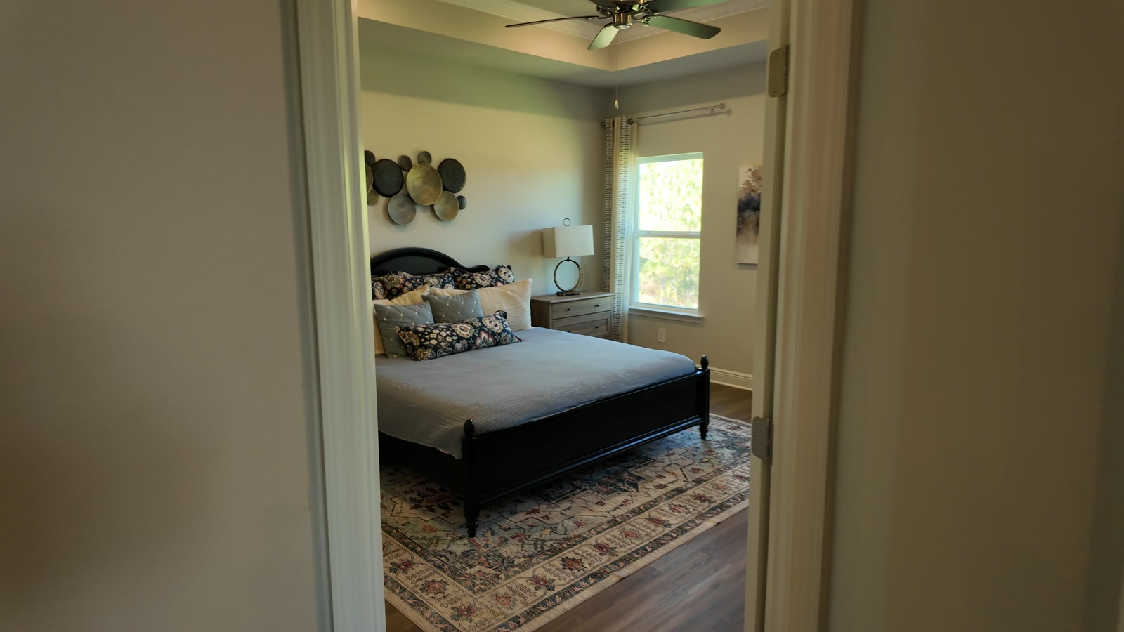 The staged primary bedroom