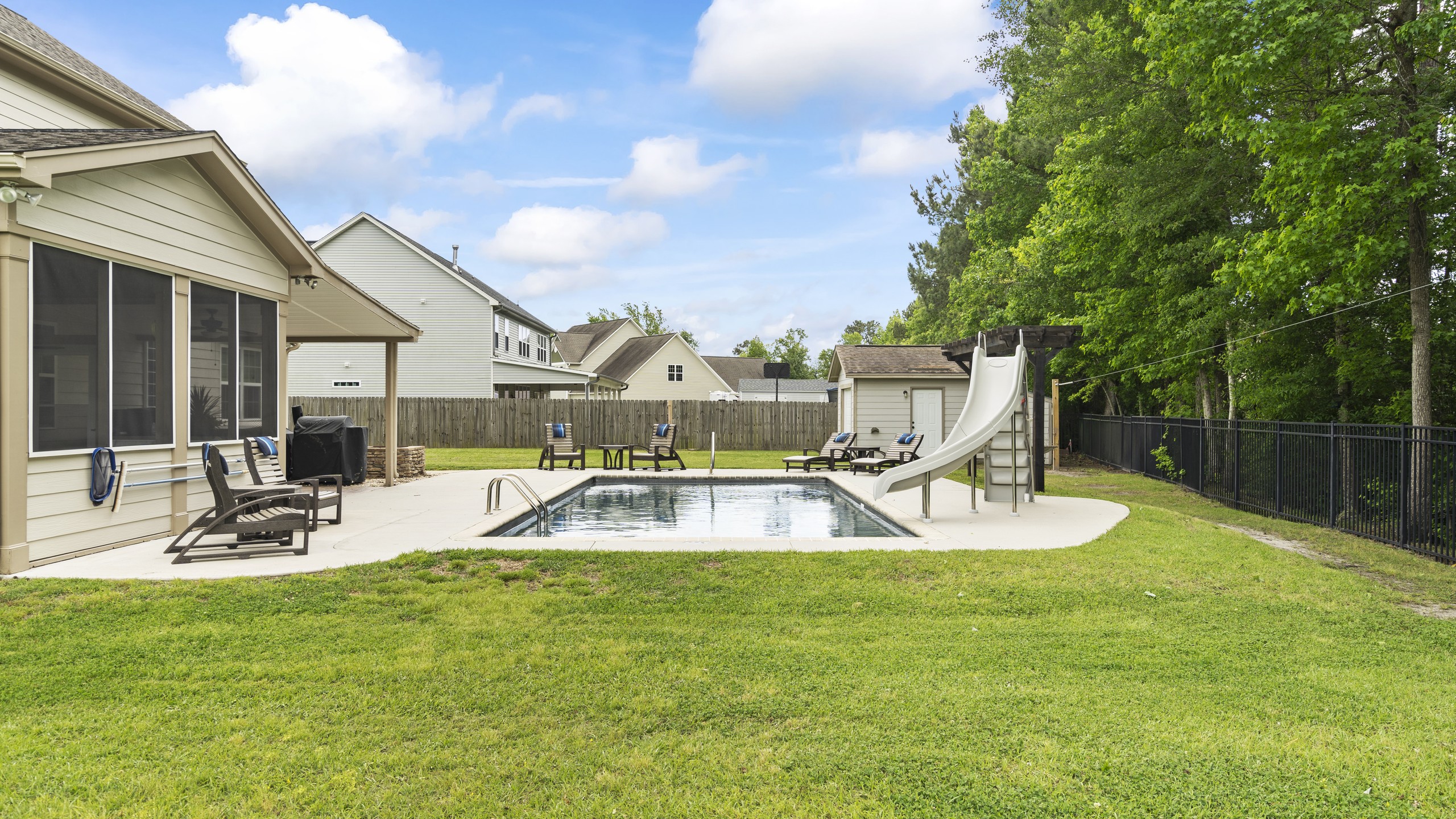 Show how the pool connects to the porch, the patio and the yard.