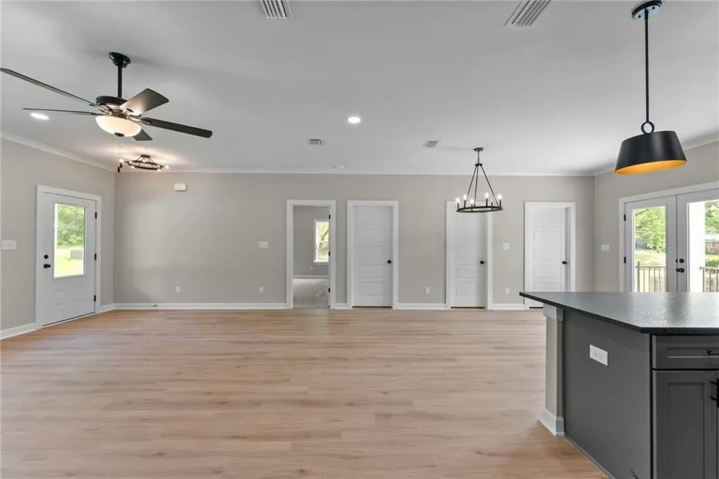 Open living and dining area in the Border Drive new construction home