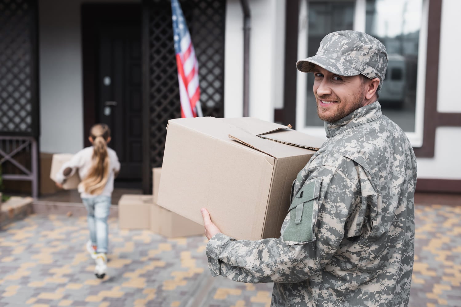 military-man-carrying-box