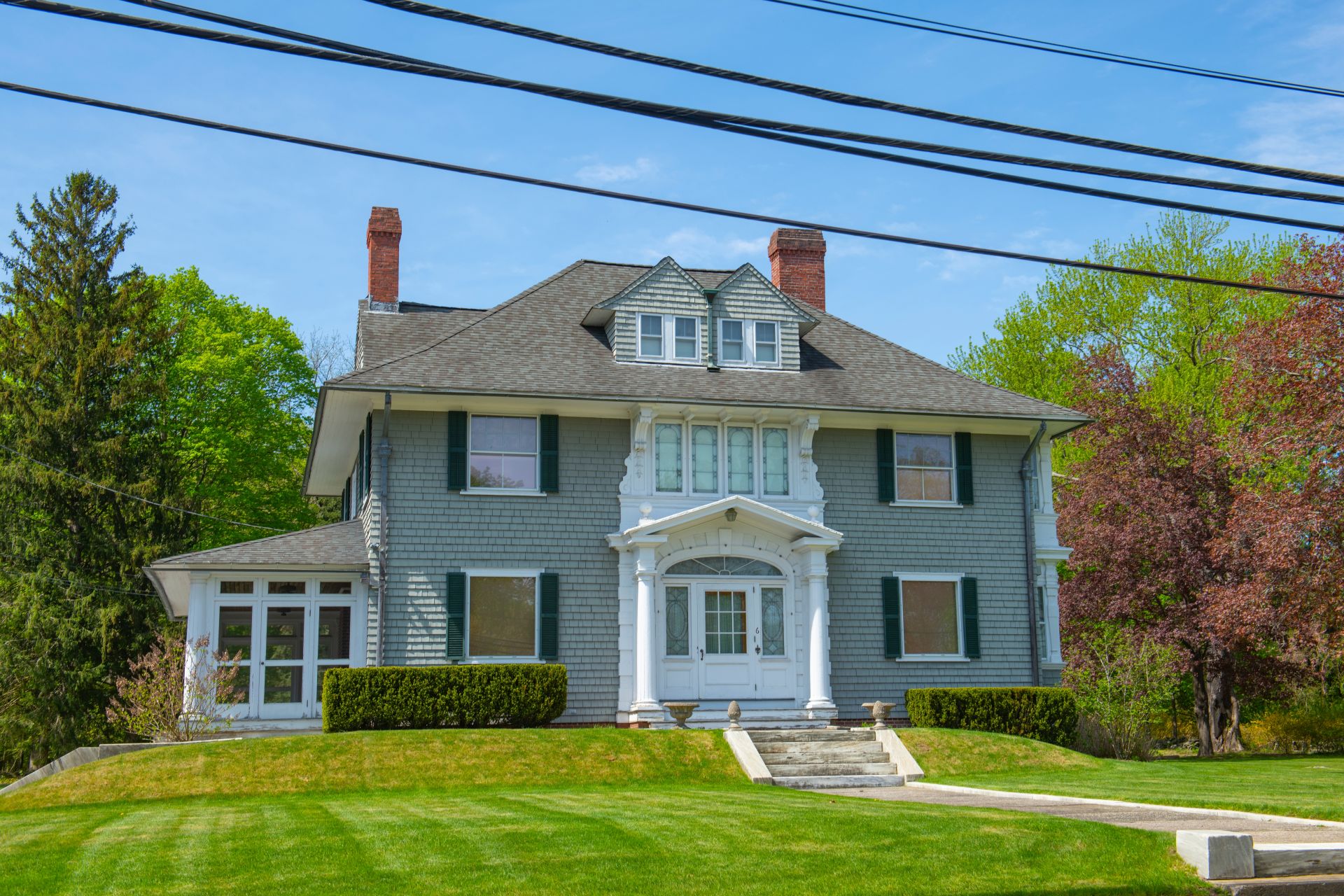 Historic colonial house at 6 Mansfield Avenue in historic town center of Norton, Bristol County, Massachusetts MA, USA.