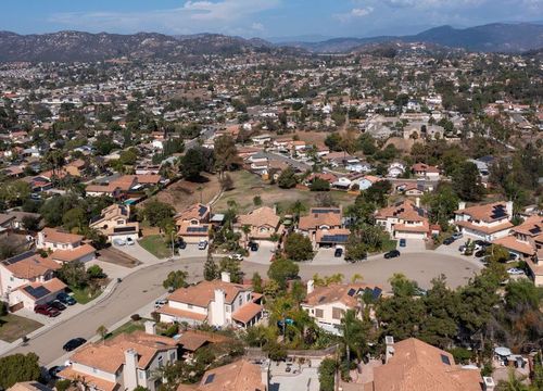 Afternoon-aerial-view-of-a-suburban-neighborhood-in-San-Marcos-California-USA-1024x575.fit