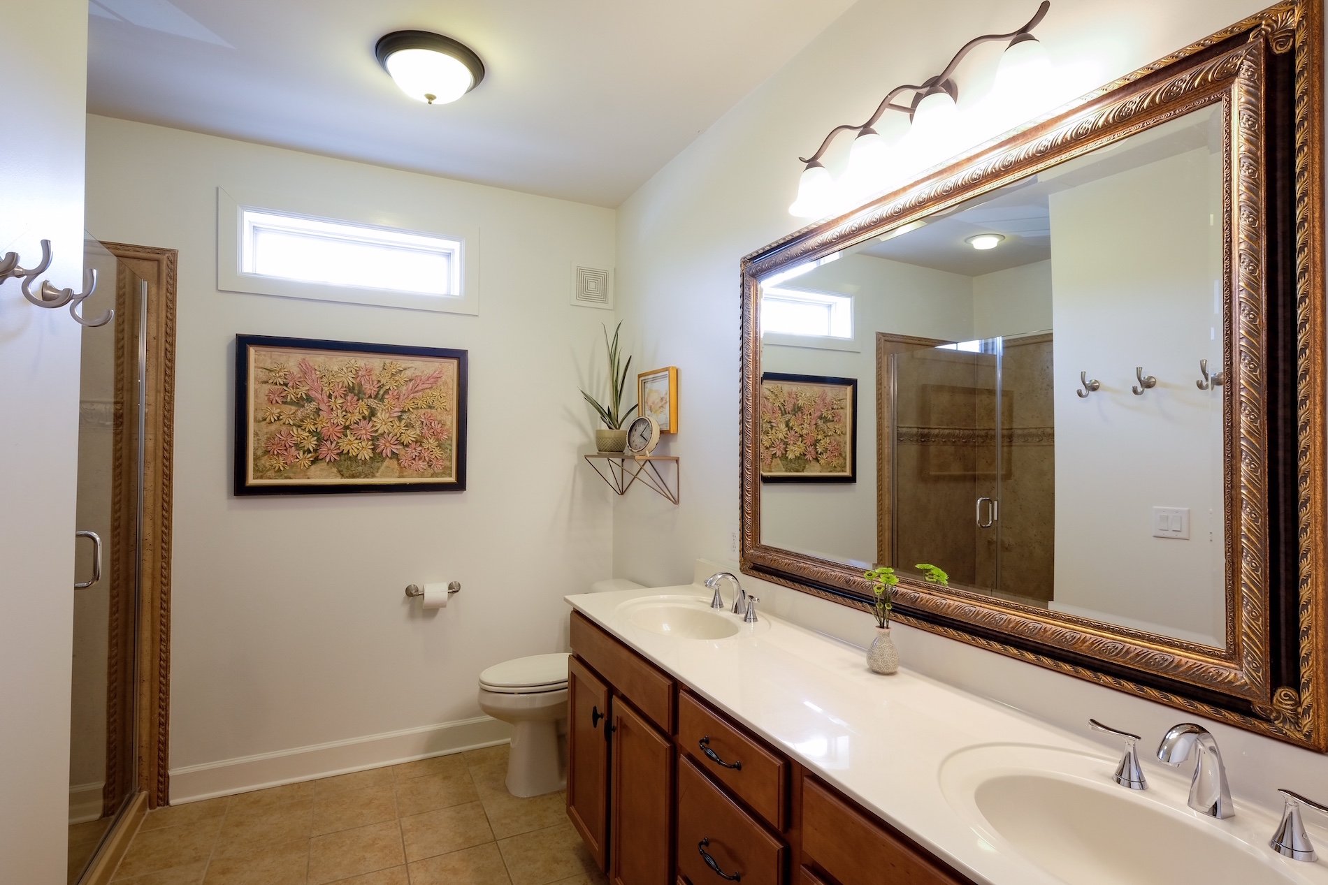 Master en suite, glass shower, his and her vanity,