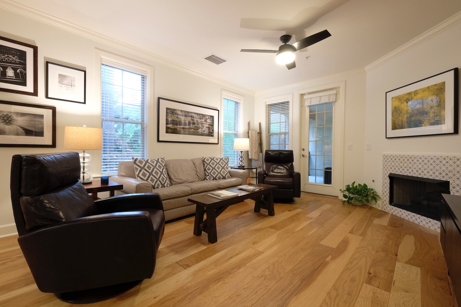 Sherwin Williams white paint, natural hickory hardwood floors, ceiling fan, painted tile fireplace