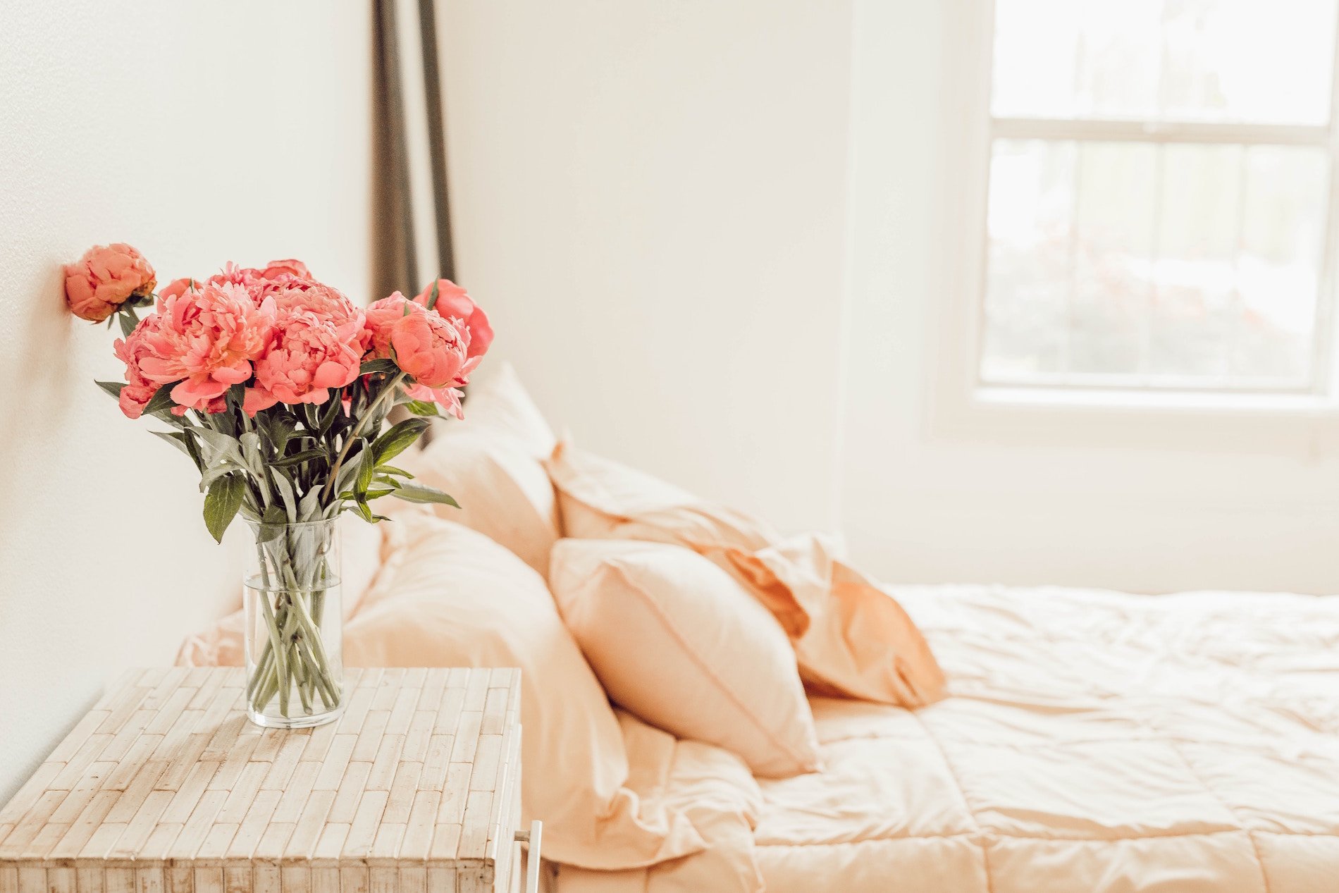 Fresh flowers, clean linens, natural light in guest room