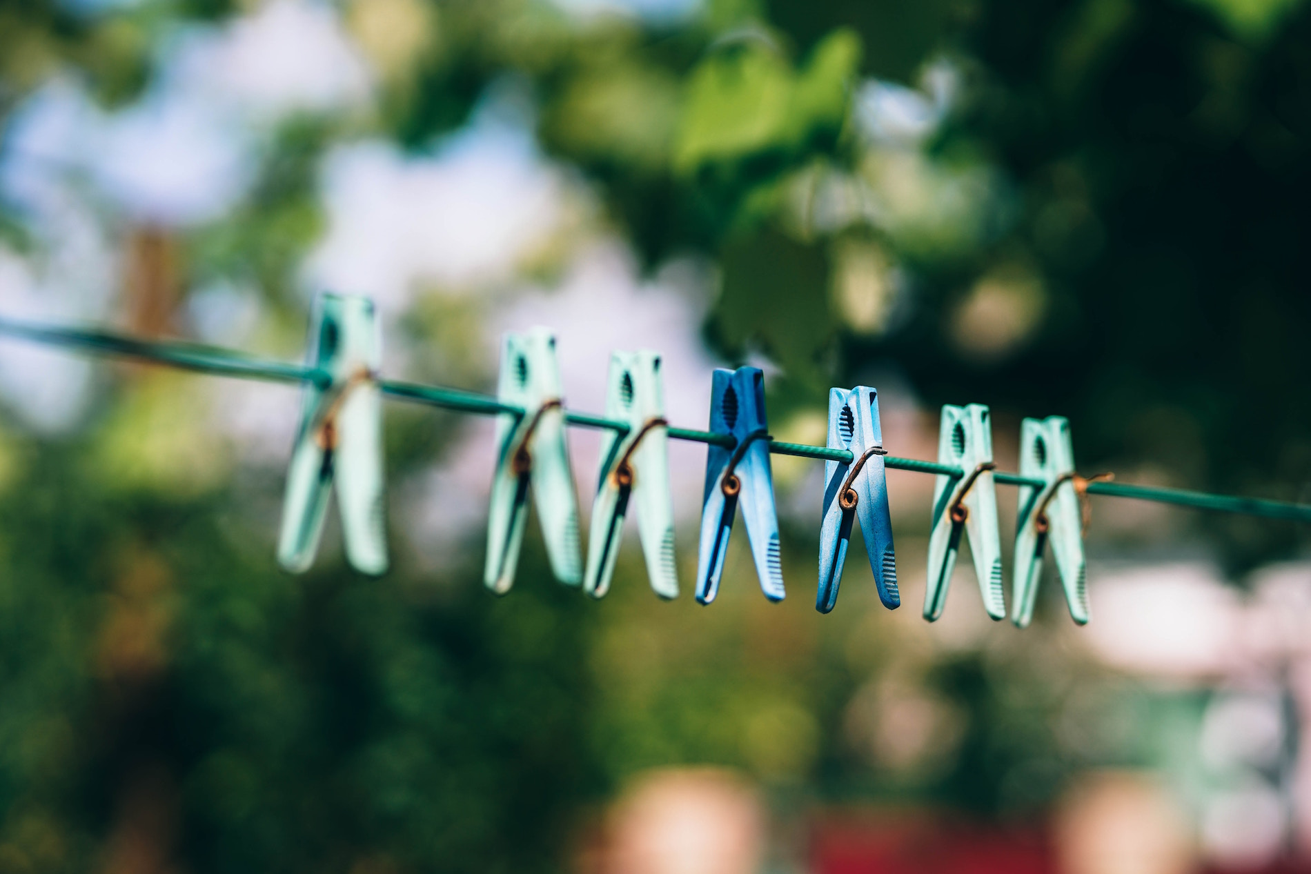 Old-fashioned line drying outside, sun bleaching, natural laundry